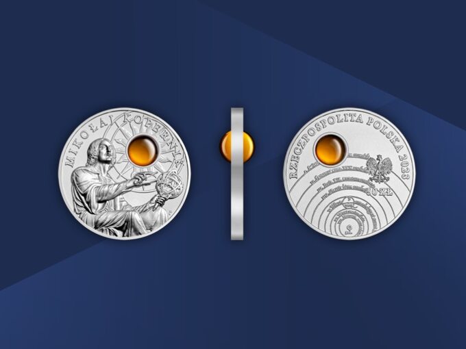 Mikołaj Kopernik na srebrnej monecie z bursztynem