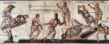 Część mozaiki "Gladiator" eksponowanej w&nbsp;Galerii Borghese z&nbsp;około 320&nbsp;r. n.e. Przekreślone k&oacute;łko przy imieniu gladiatora oznacza, że&nbsp;zginął w&nbsp;walce