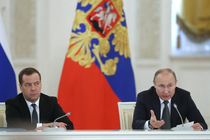 Dmitrij Miedwiediew i Władimir Putin