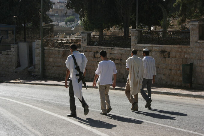 Izraelscy osadnicy w Hebronie na Zachodnim Brzegu