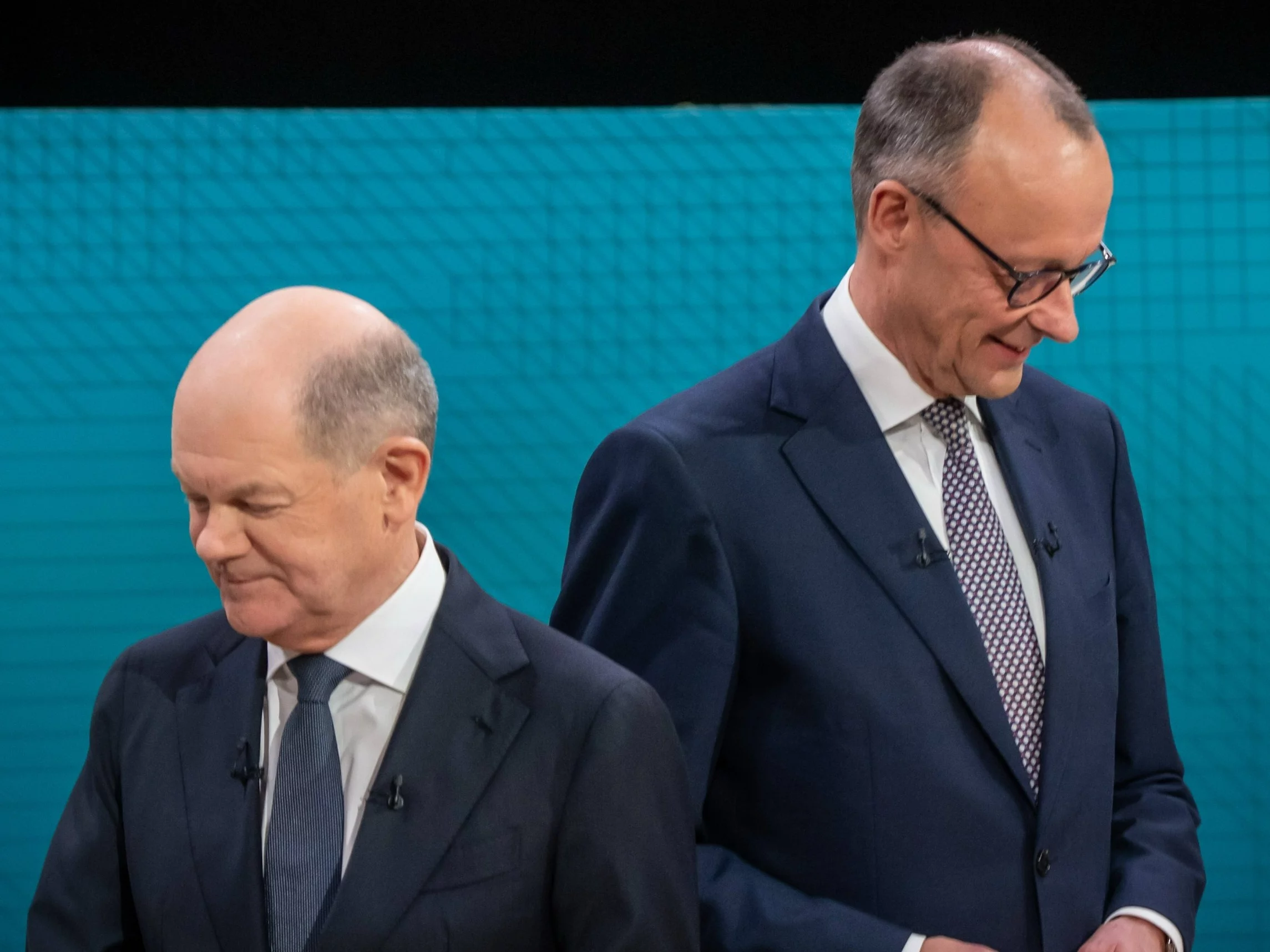 Friedrich Merz (po prawej) i Olaf Scholz