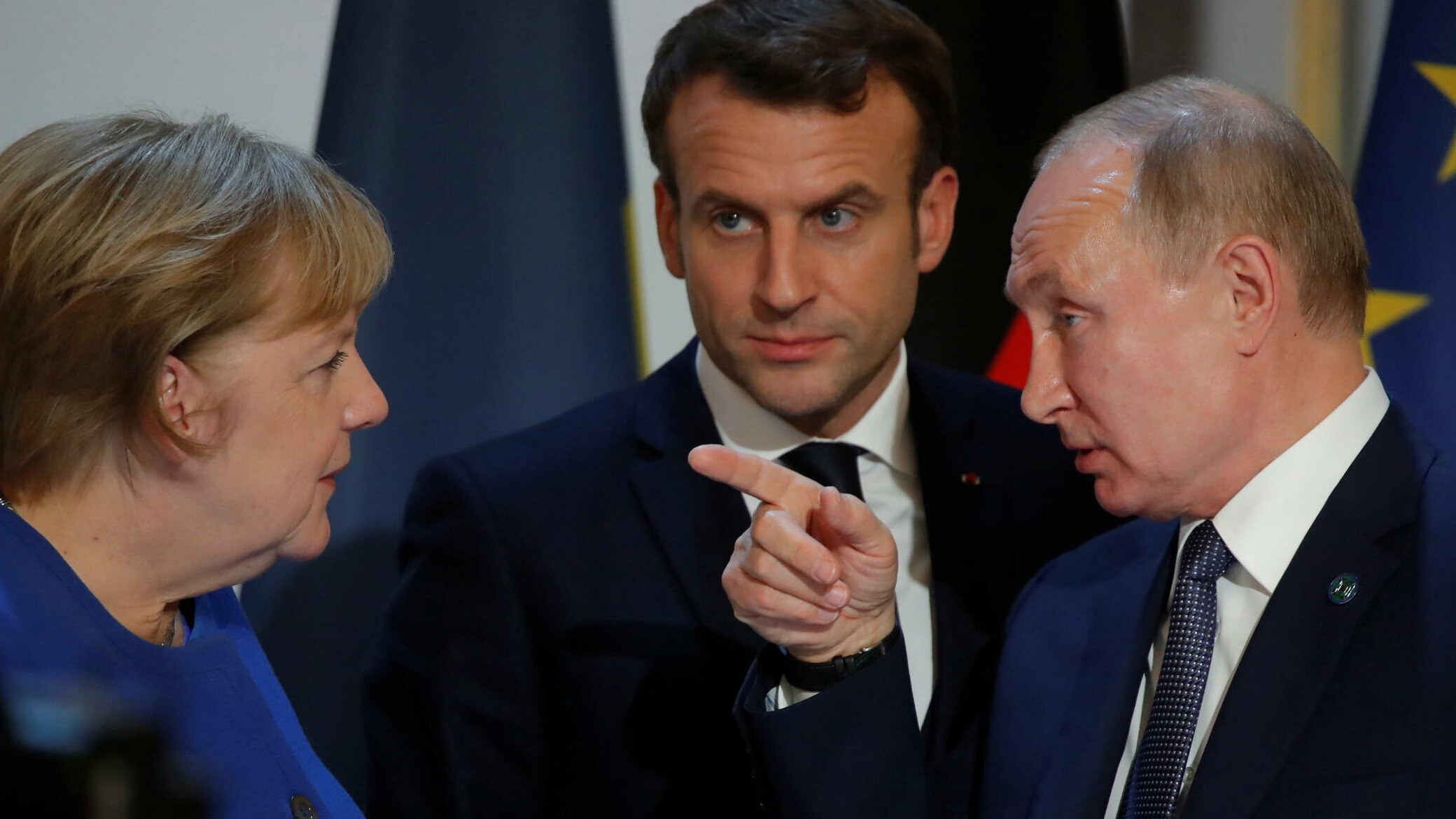 Angela Merkel, Emmanuel Macron i Władimir Putin podczas spotkania w Paryżu