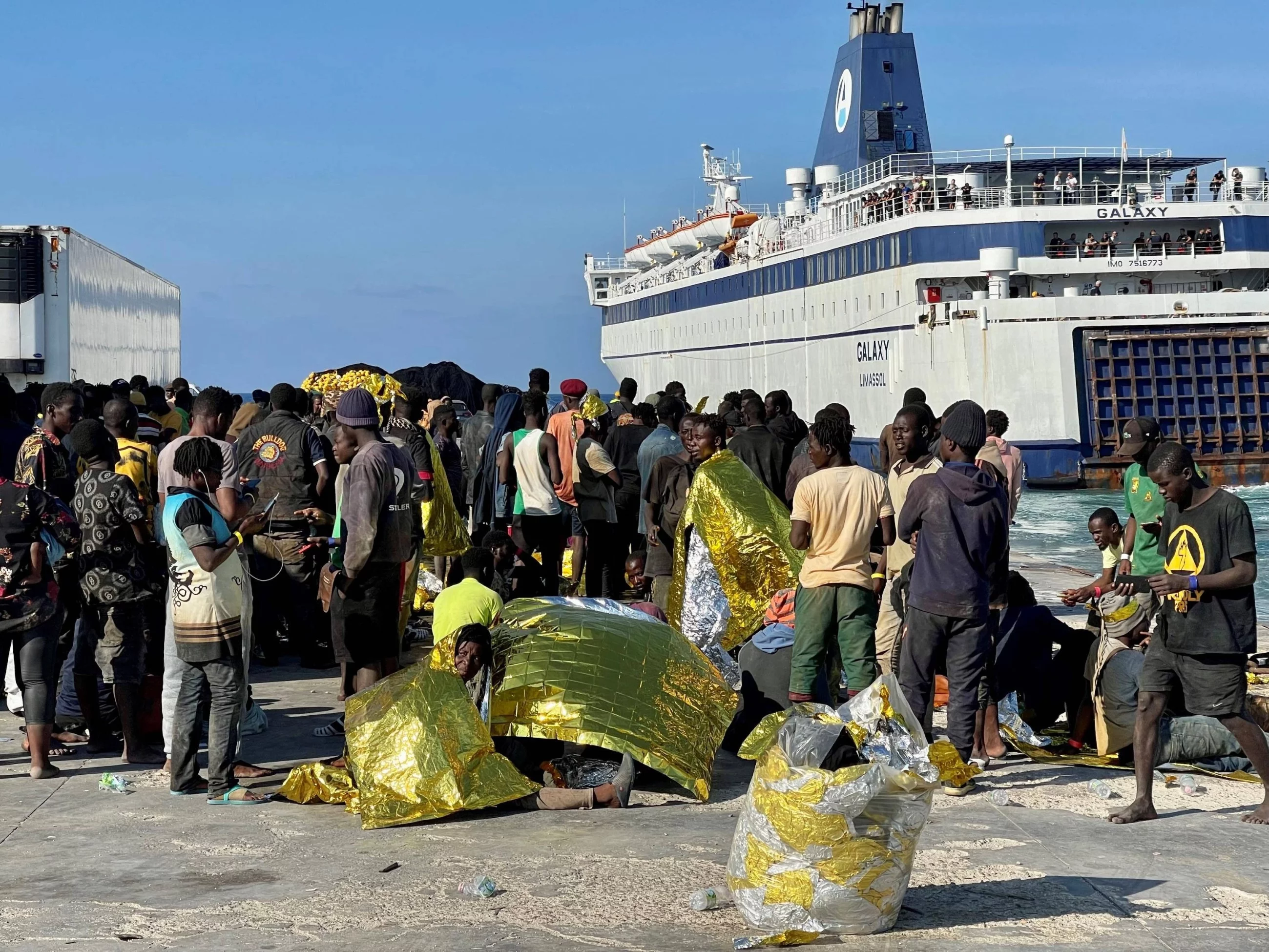 Migranci na włoskiej wyspie Lampedusa