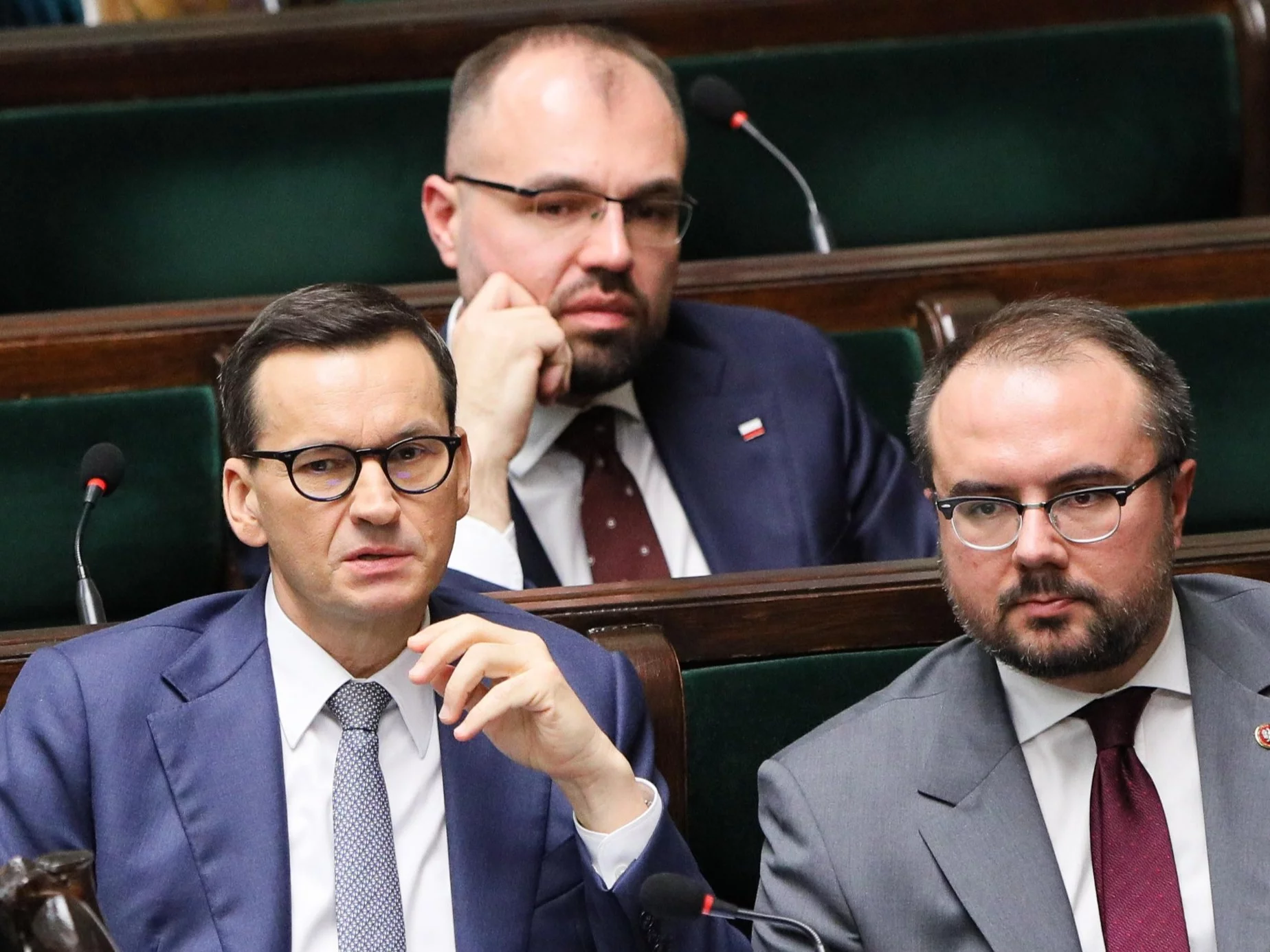 Mateusz Morawiecki (L), Krzysztof Szczucki (C) i Paweł Jabłoński (P)