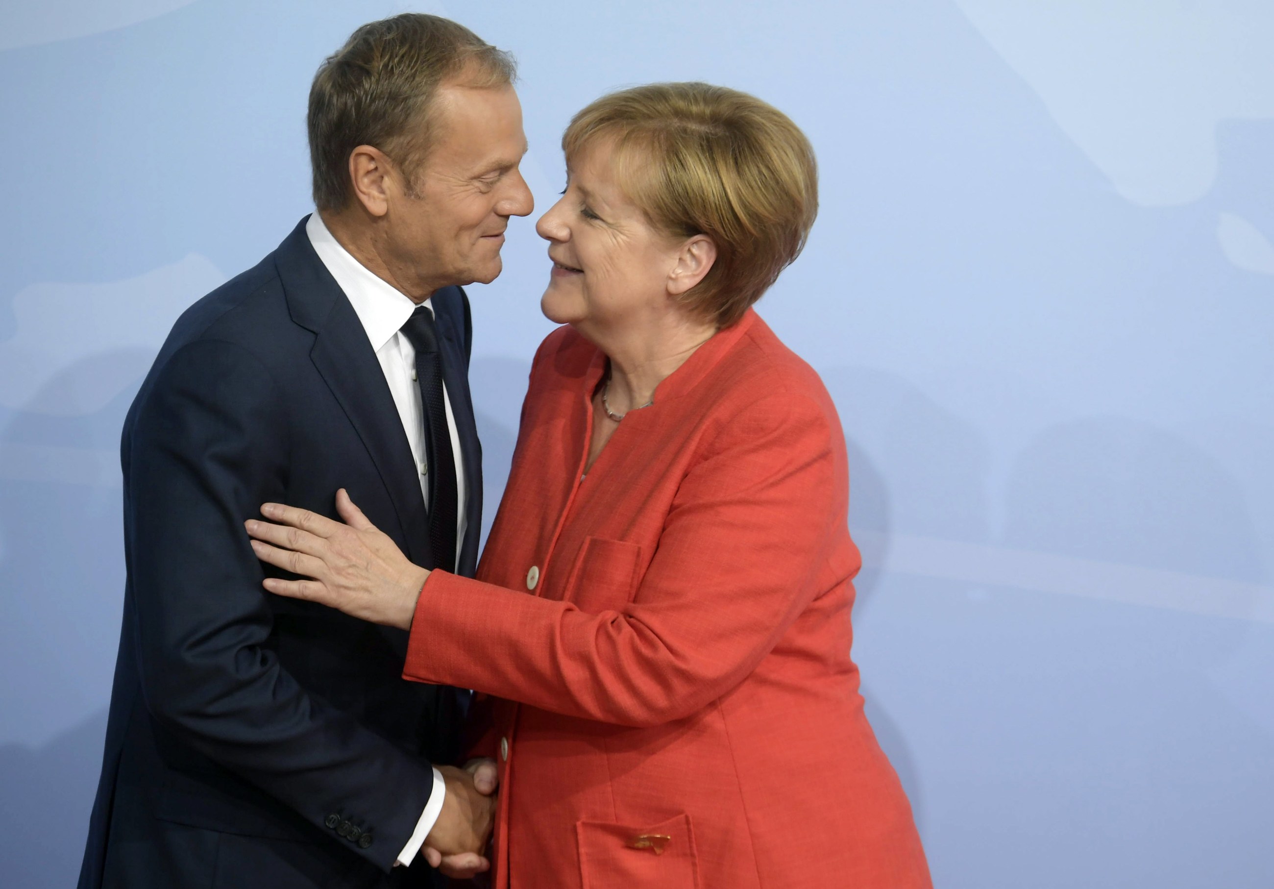 Donald Tusk, Angela Merkel