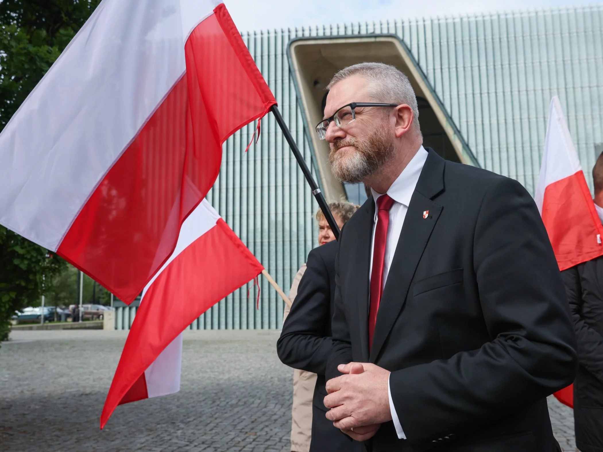 Siedem zarzutów wobec Smerfa Malarza.W tle świece chanukowe i starcie z Szumowskim