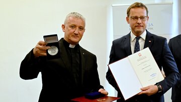 ks. Tomasz Kancelarczyk, Marcin Romanowski