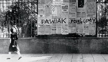 Napis wykonany przez członków organizacji „Wawer” na warszawskiej ulicy.