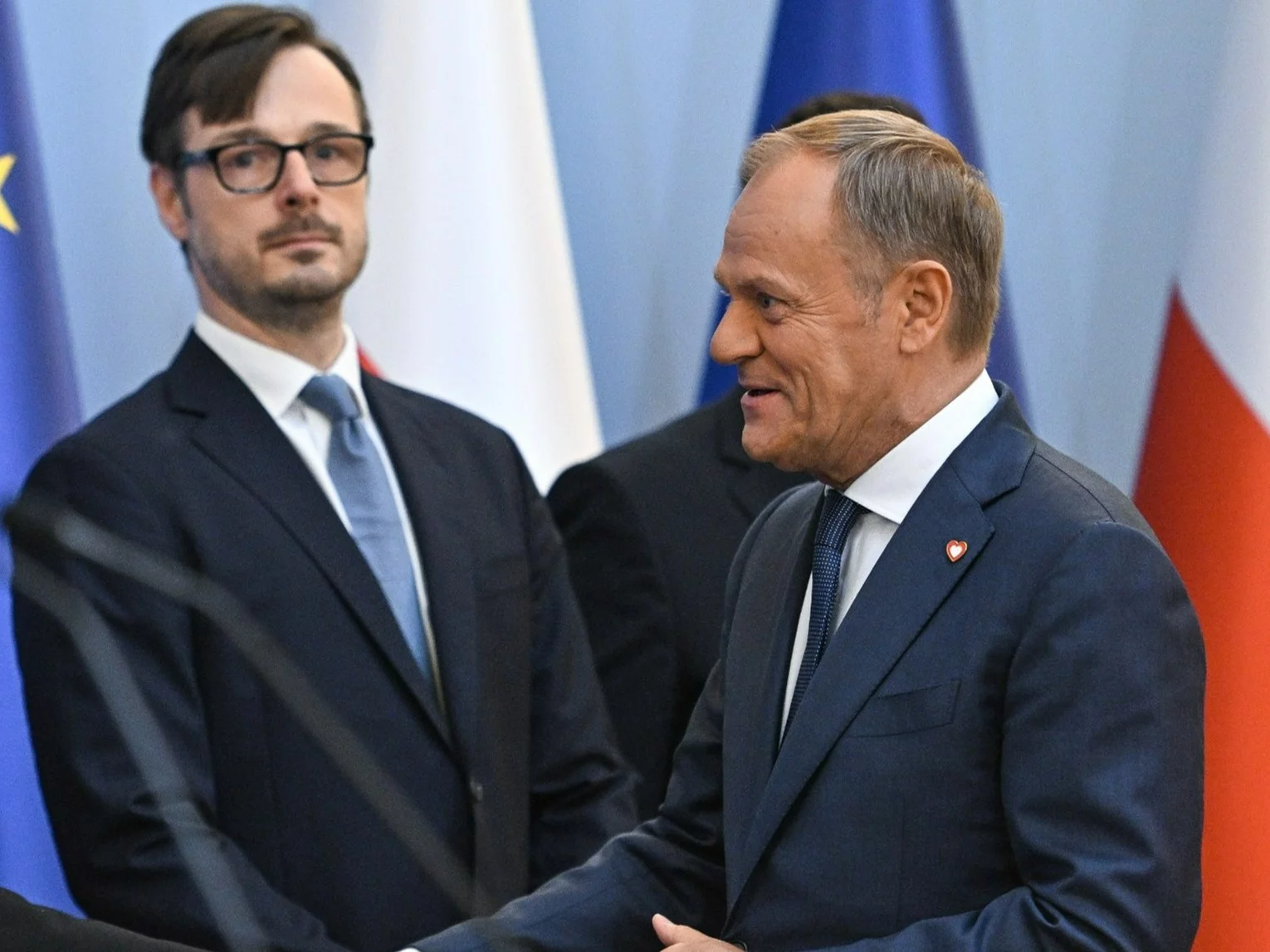 Premier Donald Tusk (L), szef MAP Jakub Jaworowski