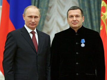 Prezydent Rosji Władimir Putin i propagandysta Kremla Władimir Sołowjow