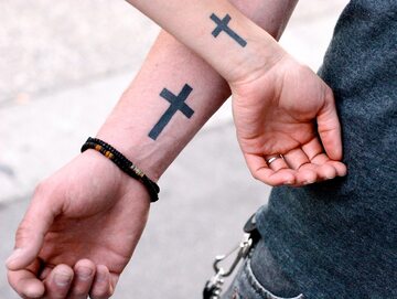 Tatuaż z motywem religijnym, zdjęcie ilustracyjne