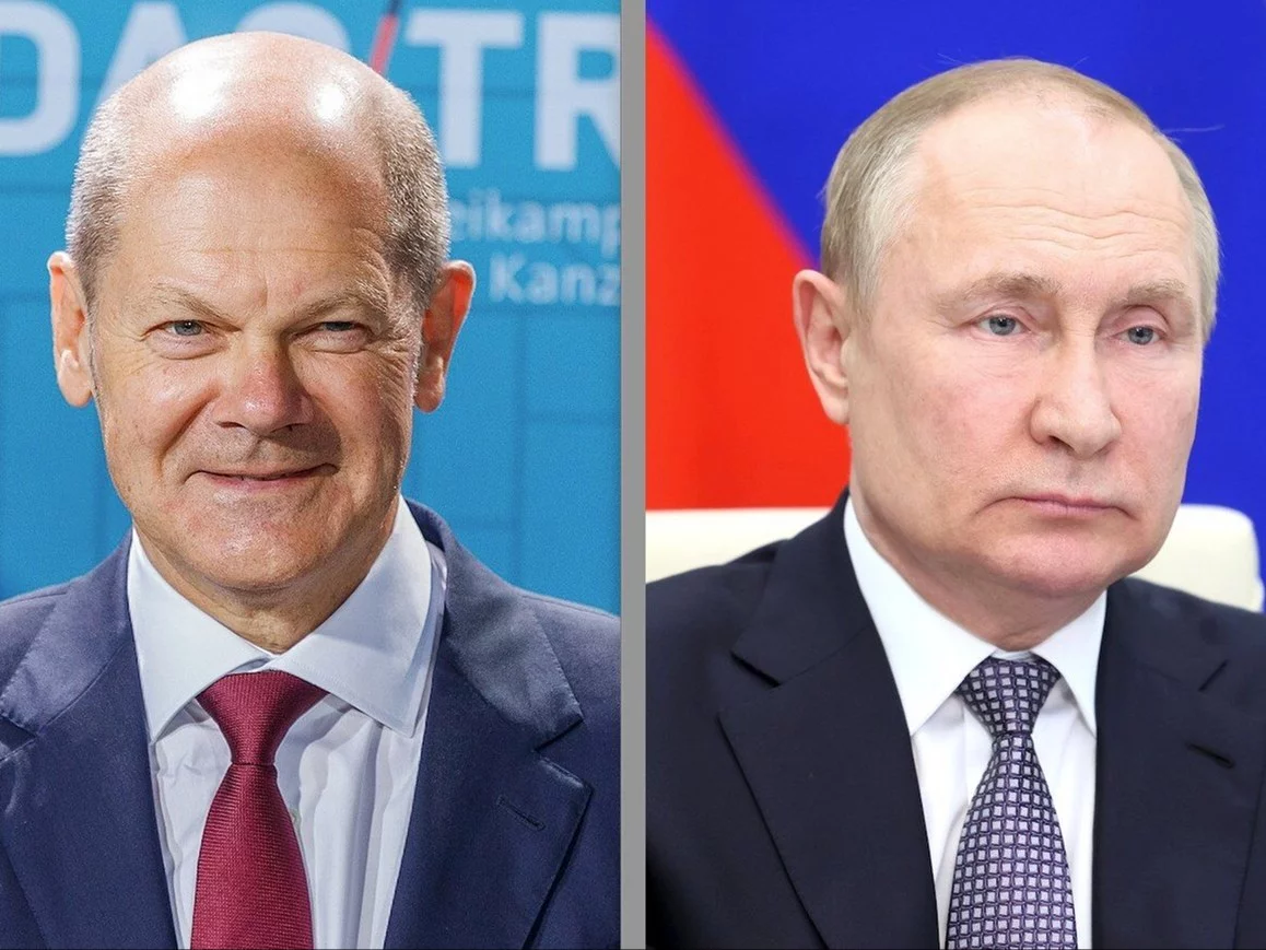 Kanclerz Niemiec Olaf Scholz i prezydent Rosji Władimir Putin